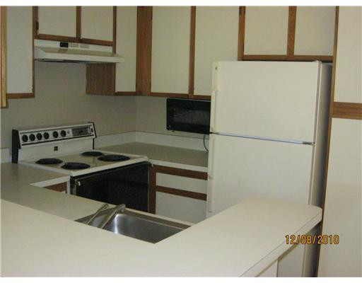 651 Lyons Road, Unit 10206 Coconut Creek, FL 33063 - Photo 2 of 4 Kitchen