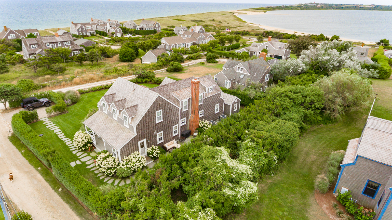 57 Quidnet Road Nantucket, MA 02554 - Photo 2 of 6 an aerial view of a house with a yard