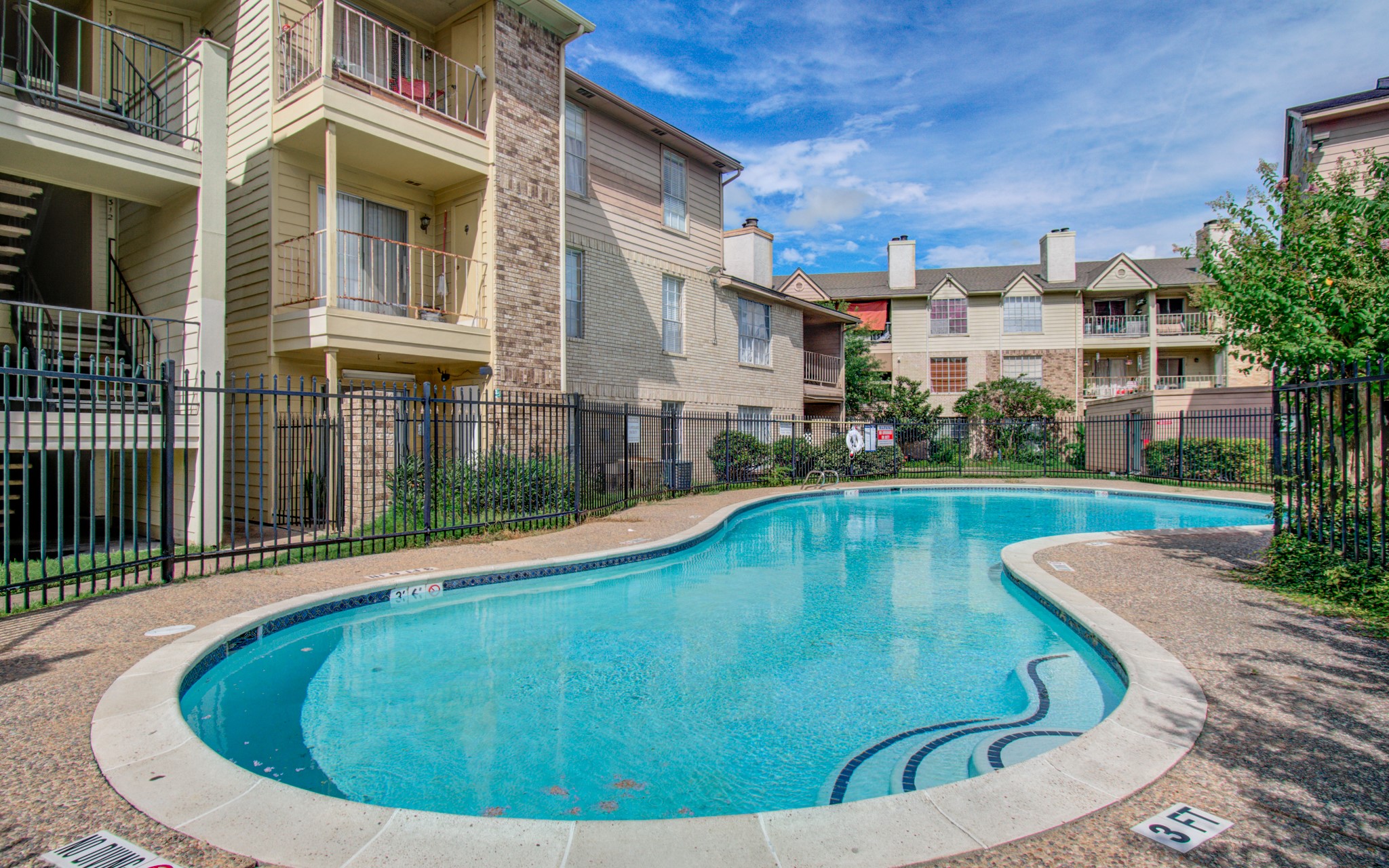 10101 South Gessner Road, Unit 405 Houston, TX 77071 - Photo 24 of 27 a view of a house with swimming pool