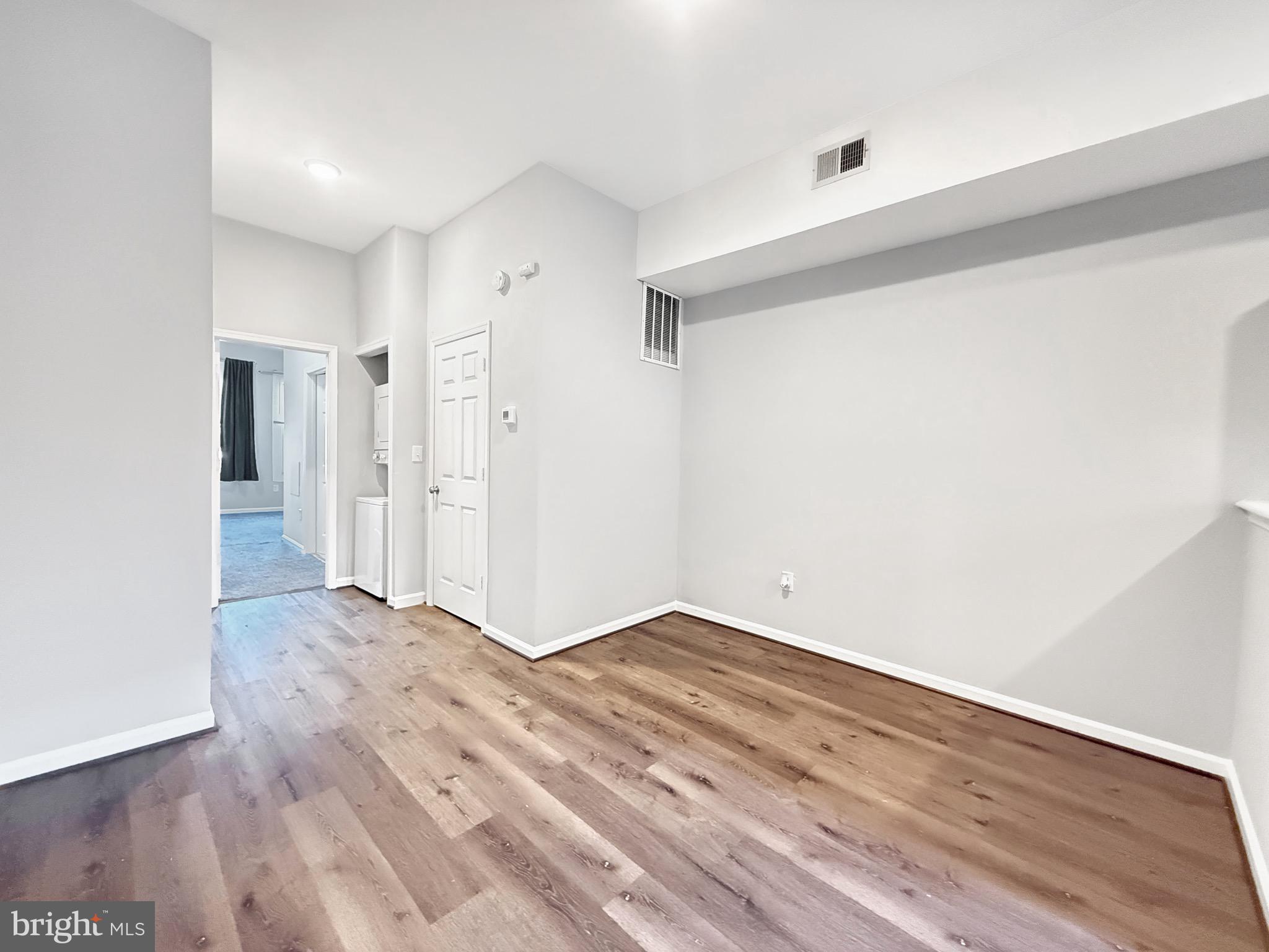135 East North Avenue, Unit 2 Baltimore, MD 21202 - Photo 27 of 29 a view of empty room with wooden floor
