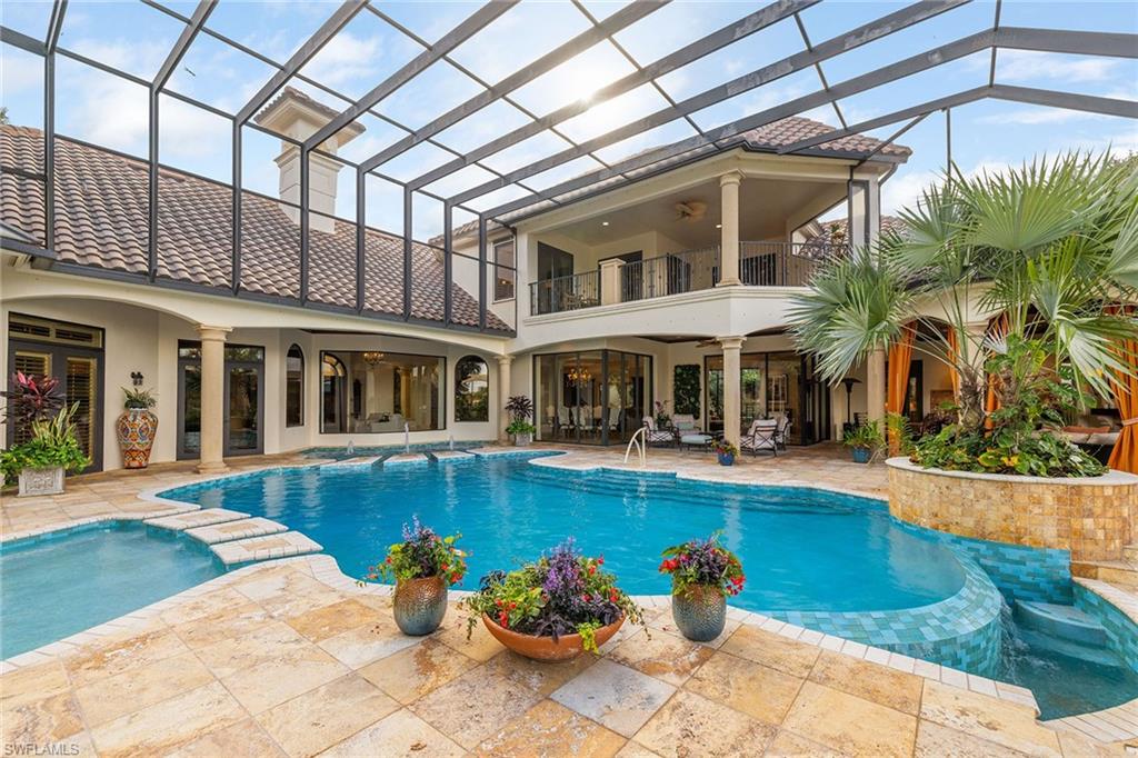 15167 Brolio Lane Naples, FL 34110 - Photo 39 of 50 a front view of a house with swimming pool