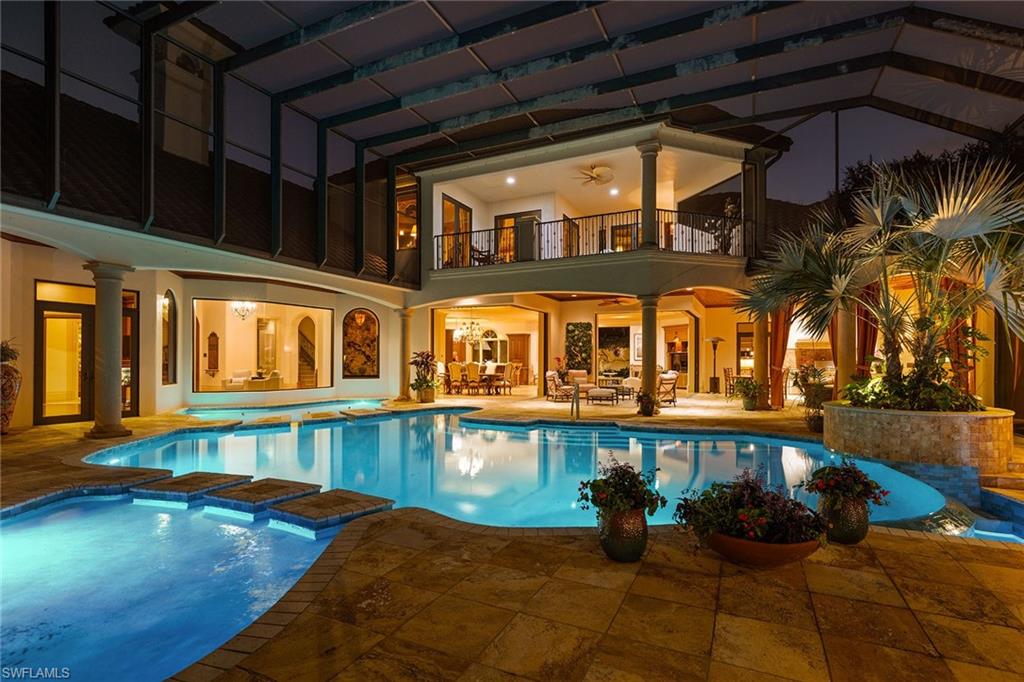 15167 Brolio Lane Naples, FL 34110 - Photo 50 of 50 a view of a swimming pool with outdoor seating