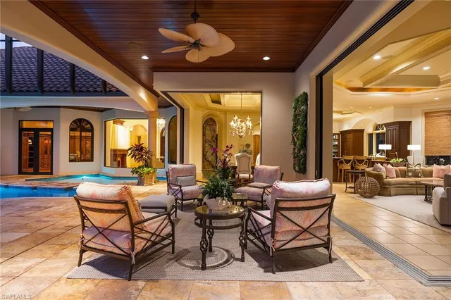 a view of a lobby with furniture and a chandelier