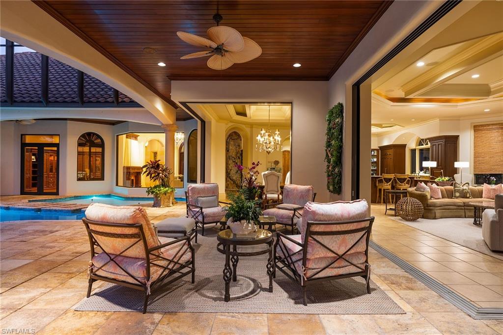 15167 Brolio Lane Naples, FL 34110 - Photo 8 of 50 a outdoor space with furniture