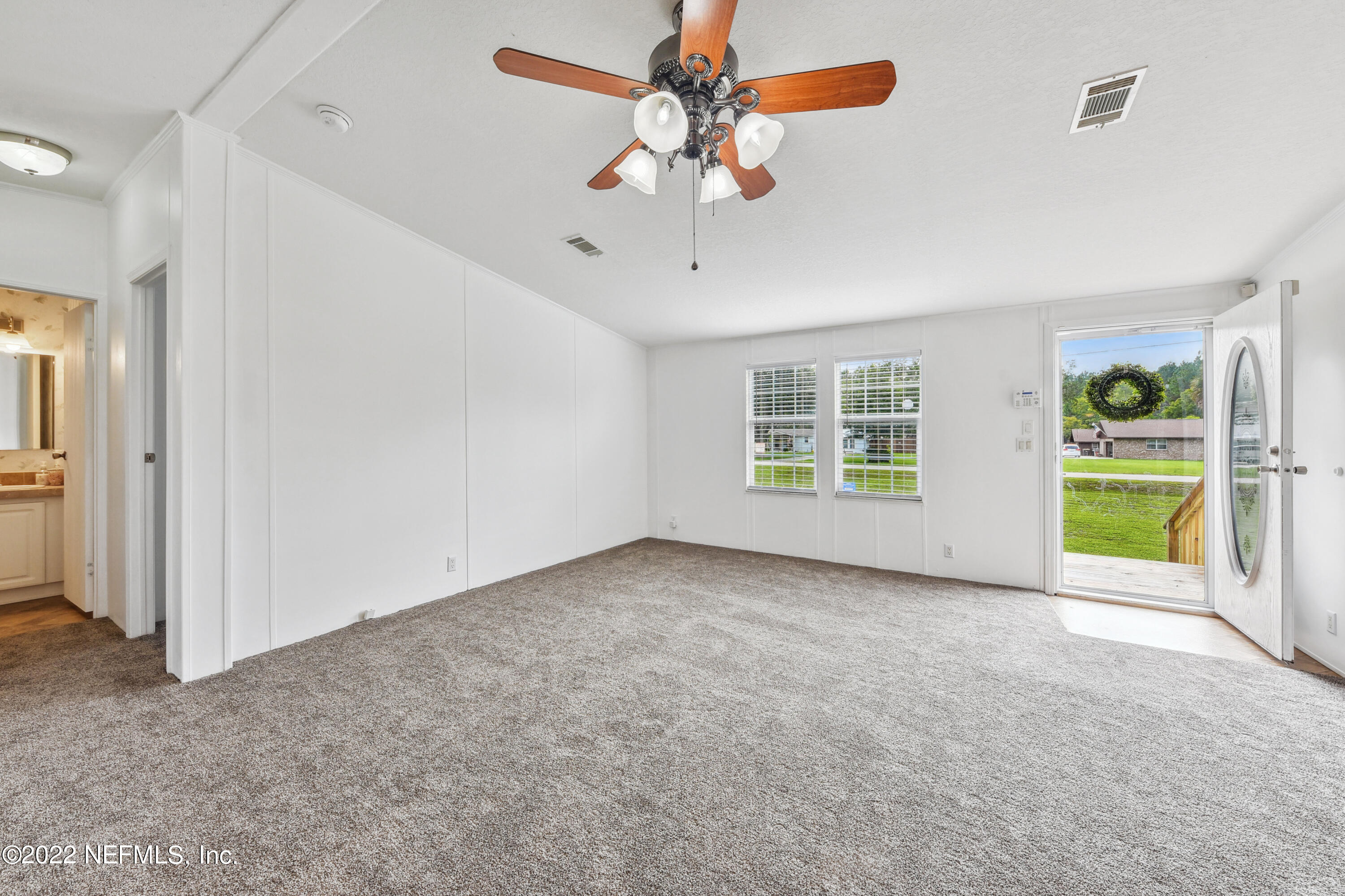 836 Halsema Road South Jacksonville, FL 32221 - Photo 11 of 31 a view of an empty room with a window