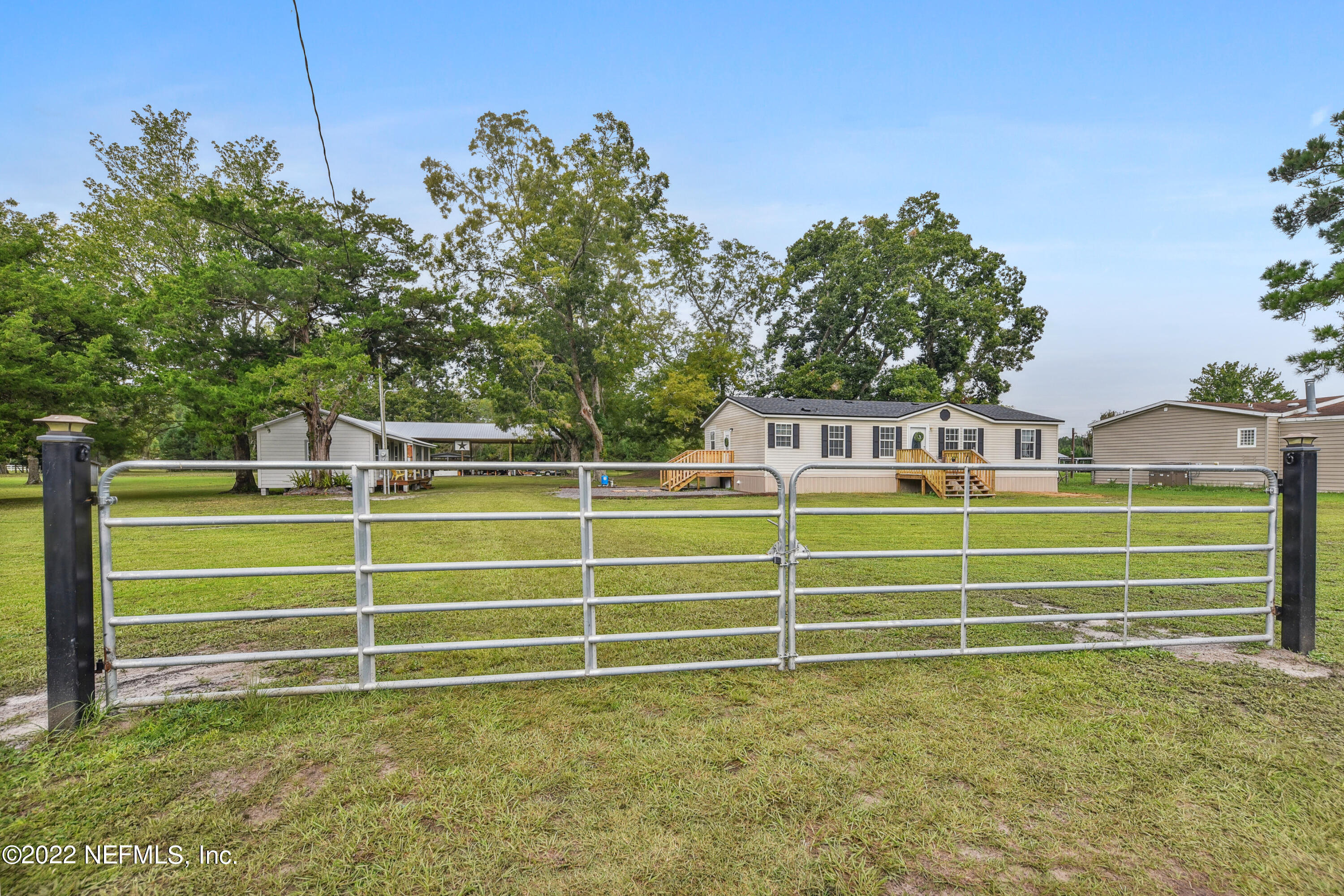 836 Halsema Road South Jacksonville, FL 32221 - Photo 2 of 31 a view of a green field