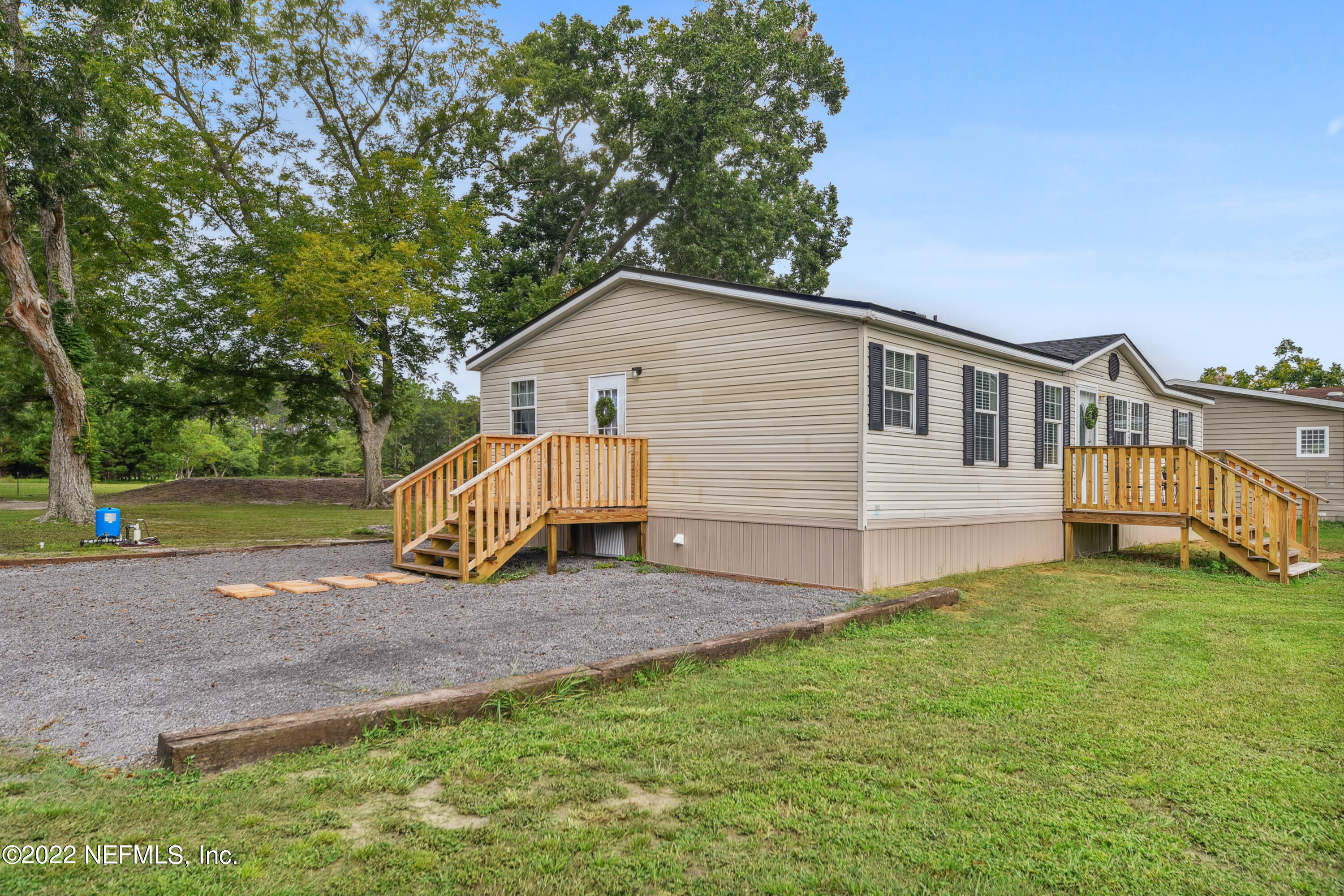 836 Halsema Road South Jacksonville, FL 32221 - Photo 25 of 31 a view of a house with a yard