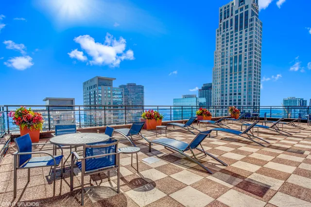 a outdoor space with lots of tables and chairs