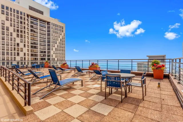 a view of a terrace with sitting area