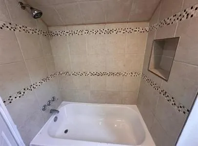 a bathroom with a bathtub