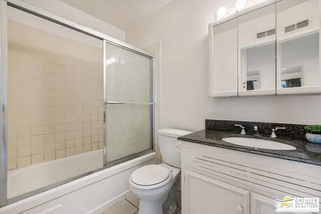 a view of a kitchen with a sink