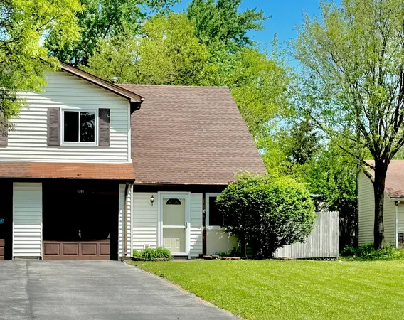 a front view of house with yard