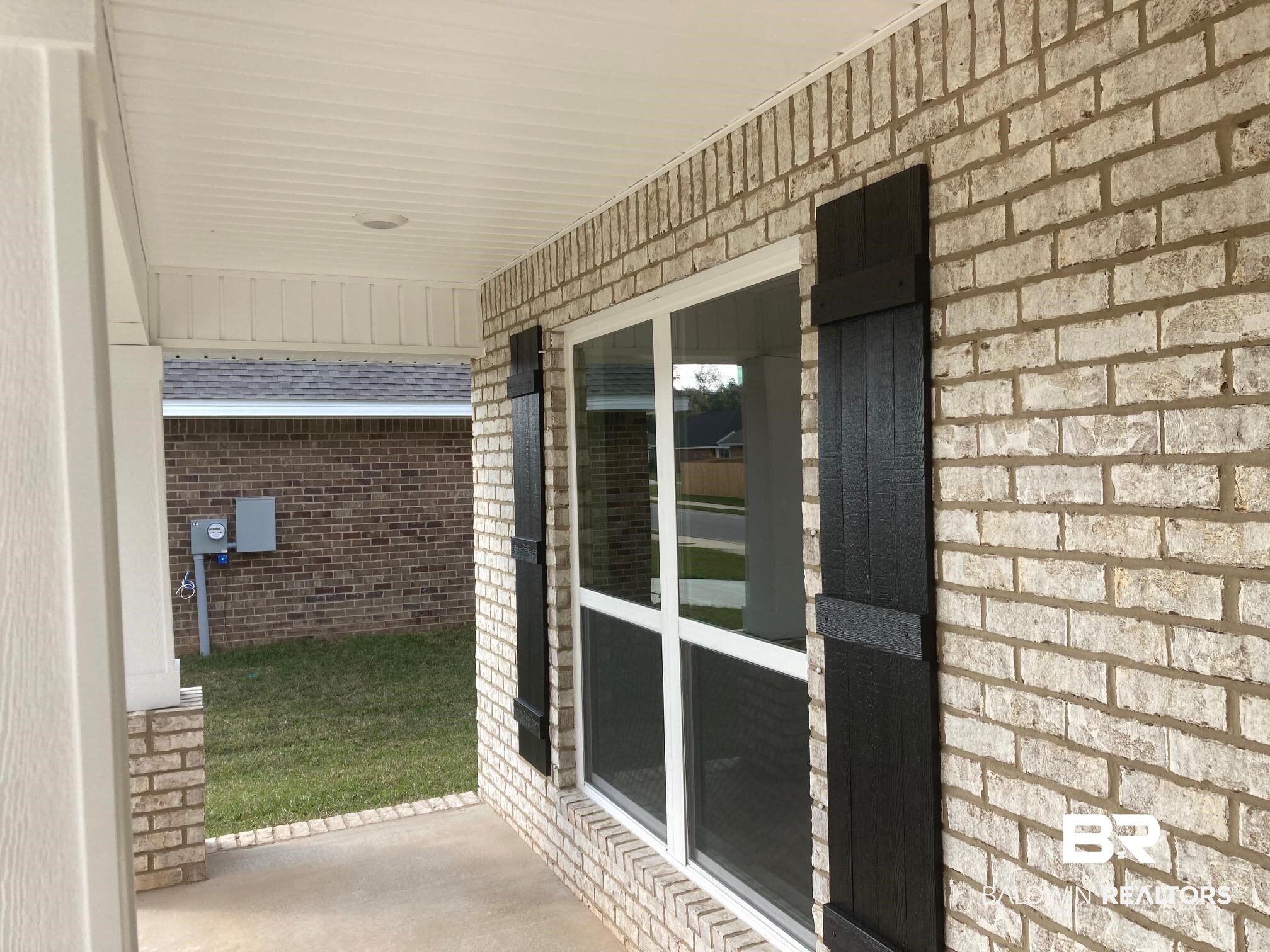 629 Revere Street Foley, AL 36535 - Photo 3 of 30 View of patio featuring covered porch