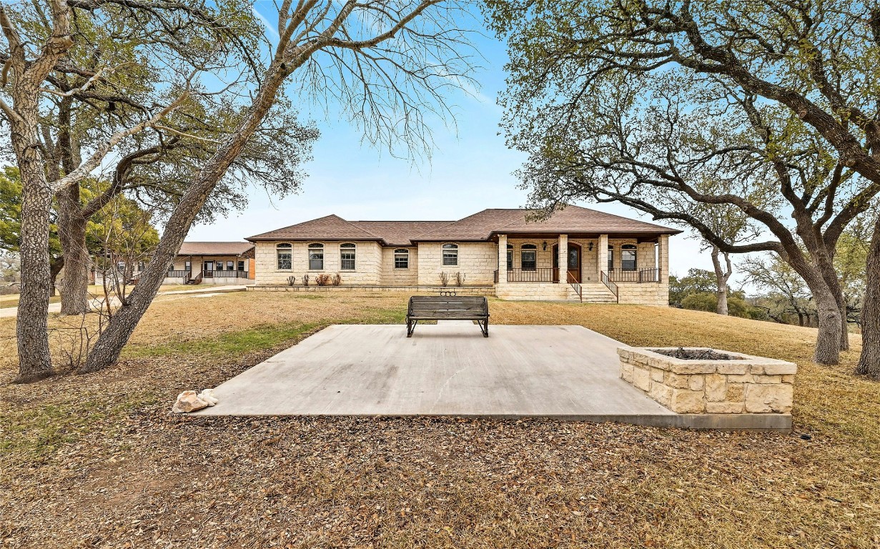 211 Summit Ridge Road Burnet, TX 78611 - Photo 25 of 35 a front view of a house with a yard