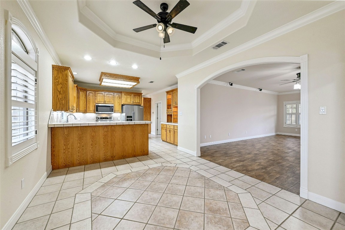 211 Summit Ridge Road Burnet, TX 78611 - Photo 7 of 35 a view of kitchen with granite countertop cabinets and window