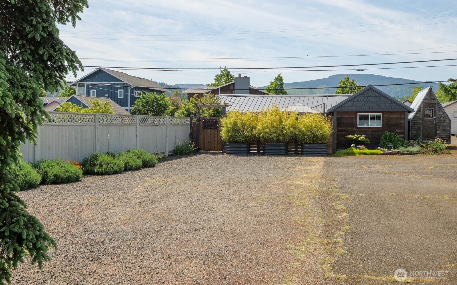 233 West Washington Street Sequim, WA 98382 - Photo 35 of 40 a view of a house with a outdoor space