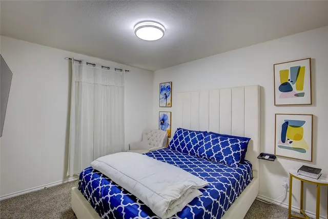 a bathroom with a sink toilet tub and shower