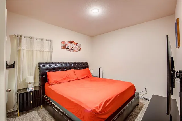 a bathroom with a sink mirror toilet and bathtub