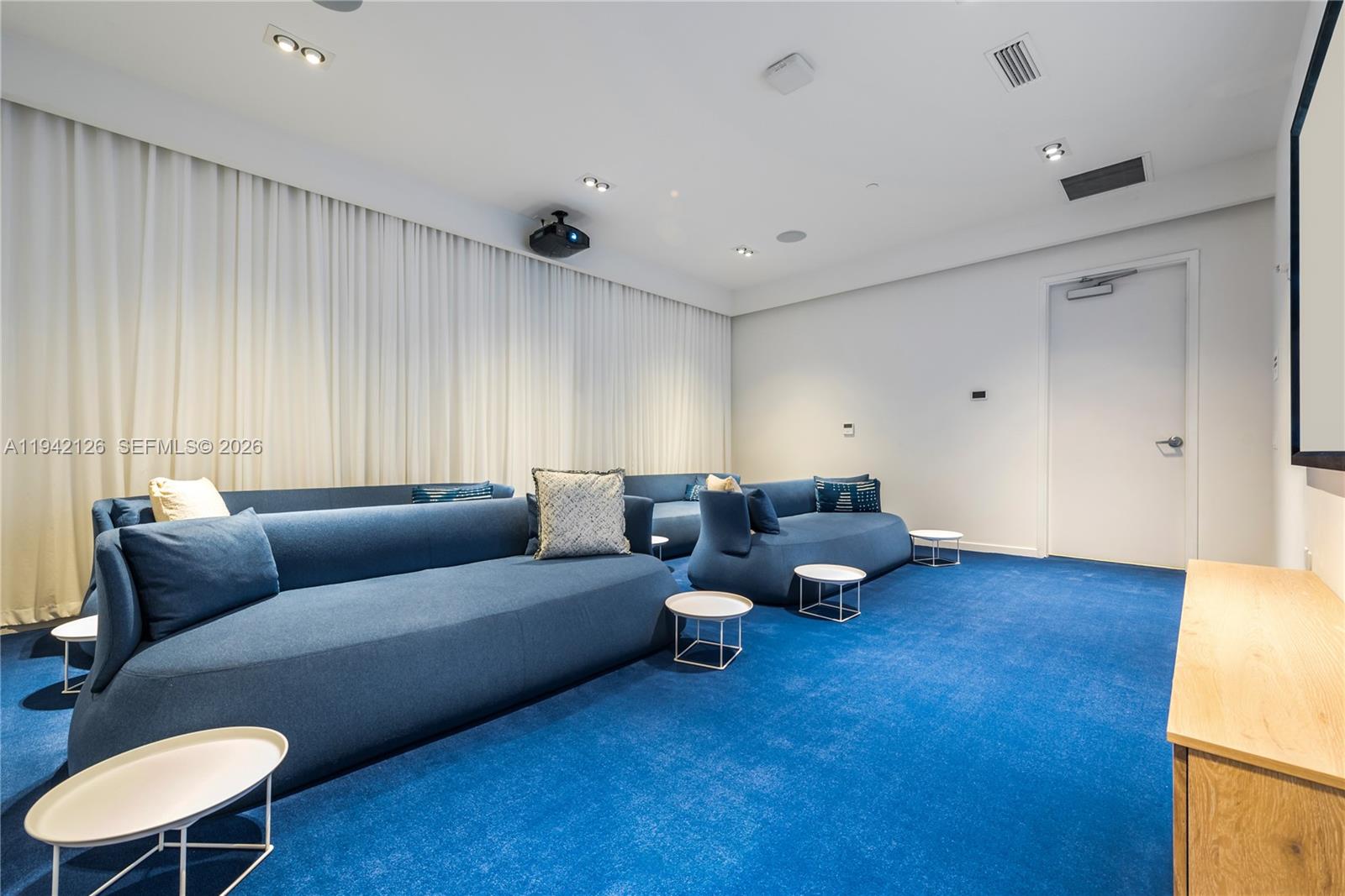 401 North Birch Road, Unit 701 Fort Lauderdale, FL 33304 - Photo 20 of 75 a living room with furniture and a wooden floor