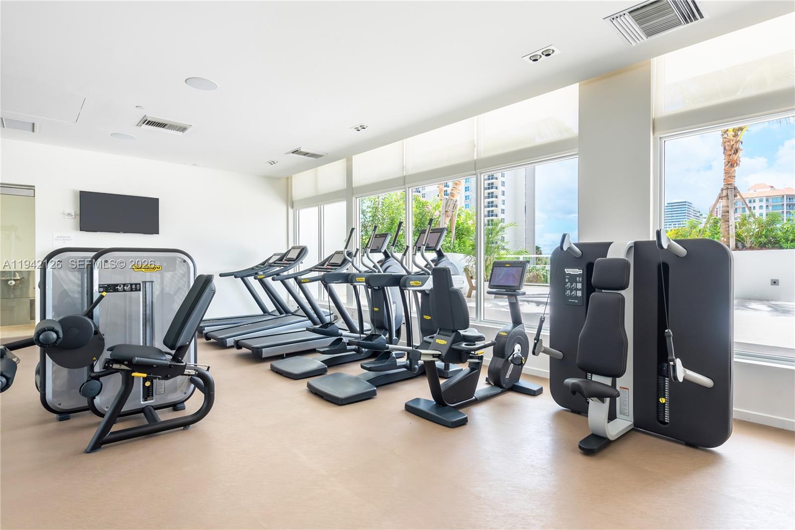 401 North Birch Road, Unit 701 Fort Lauderdale, FL 33304 - Photo 24 of 75 a view of a room with gym equipment