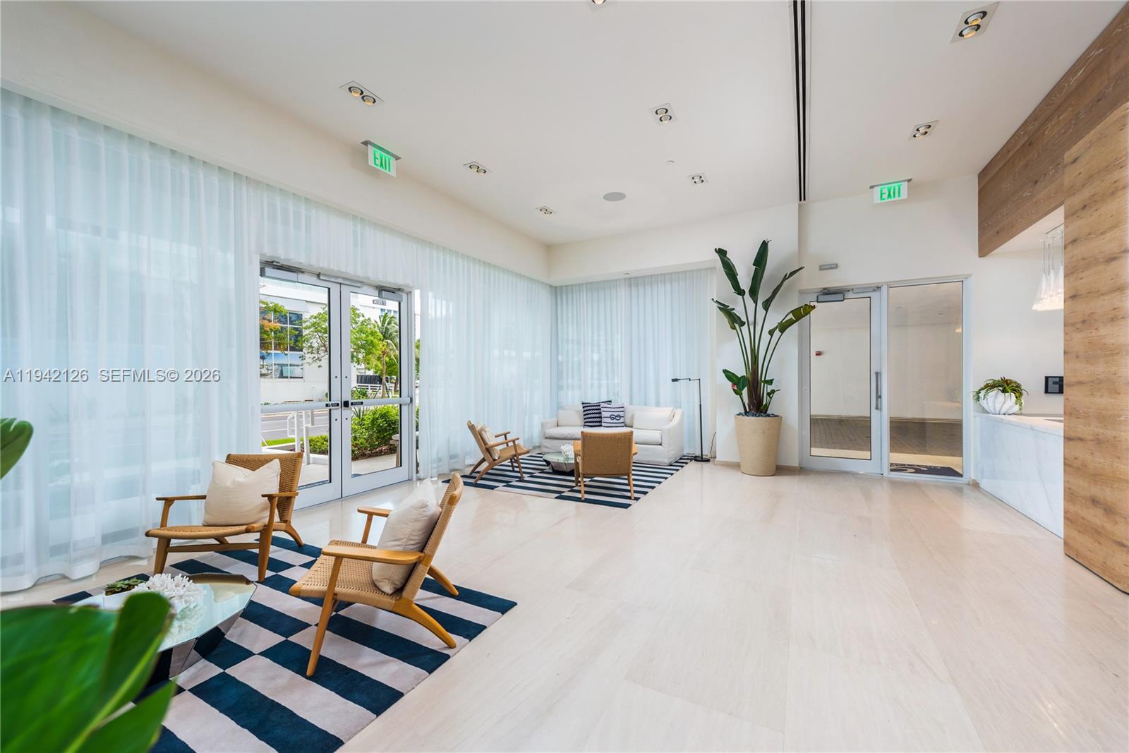 401 North Birch Road, Unit 701 Fort Lauderdale, FL 33304 - Photo 57 of 75 a living room with furniture and a potted plant