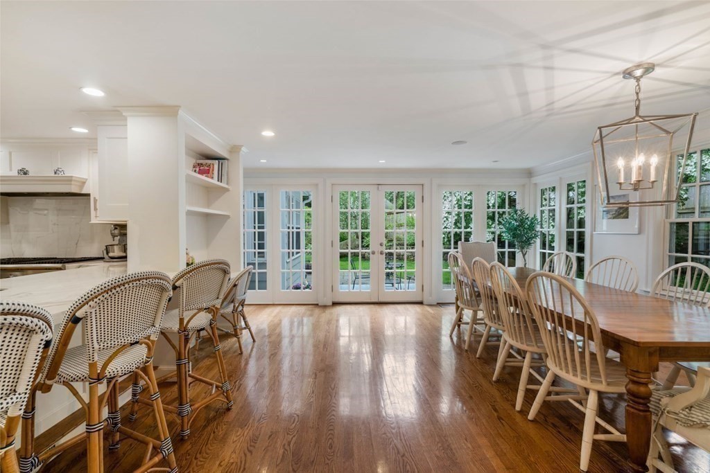 15 Woodridge Road Wellesley, MA 02482 - Photo 14 of 36 a view of a dining room with furniture wooden floor and chandelier