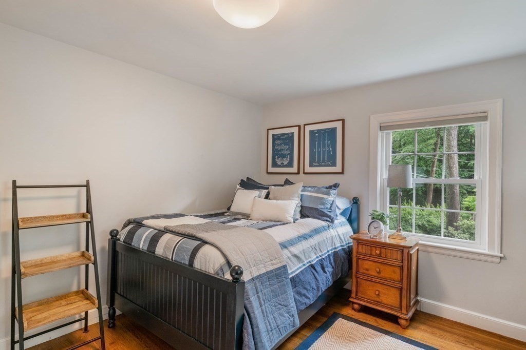 15 Woodridge Road Wellesley, MA 02482 - Photo 23 of 36 a bedroom with a bed and a window