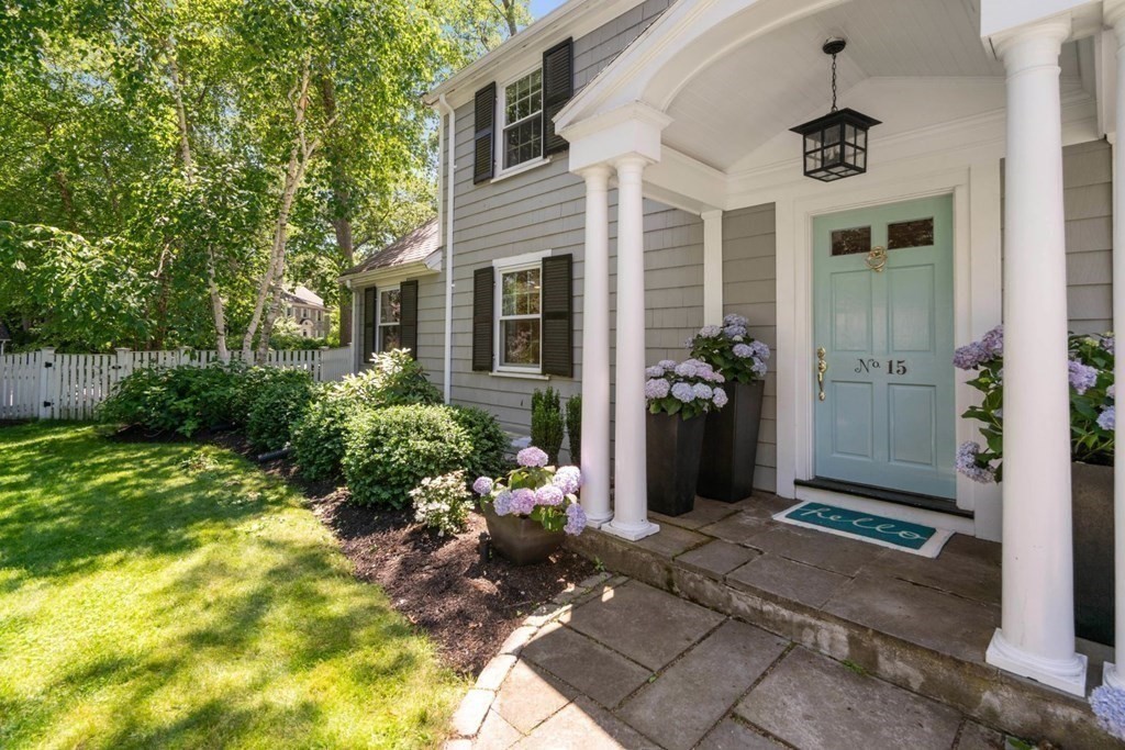 15 Woodridge Road Wellesley, MA 02482 - Photo 3 of 36 a front view of a house with a yard