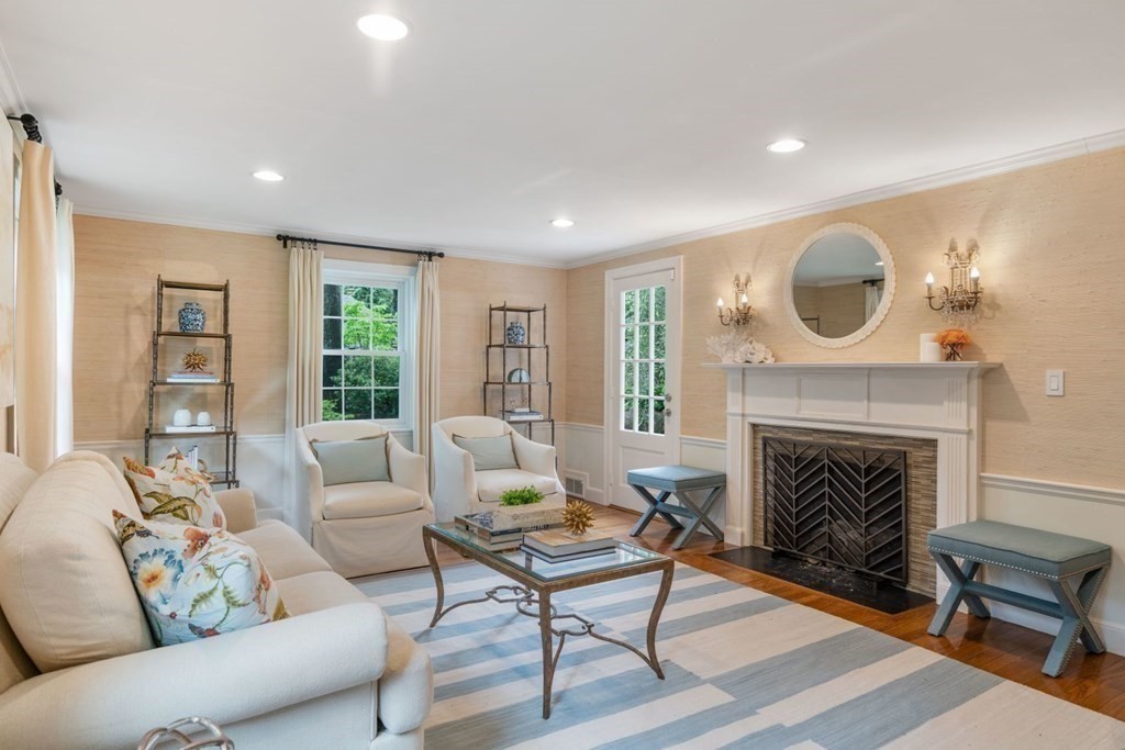 15 Woodridge Road Wellesley, MA 02482 - Photo 6 of 36 a living room with furniture and a fireplace