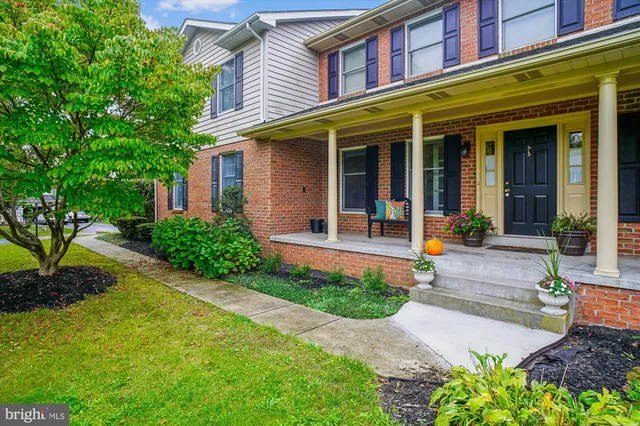 a view of a building with potted plants