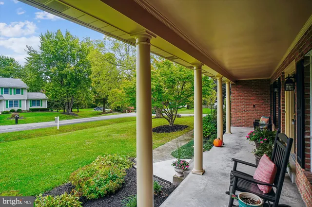 a house view with a sitting space and garden view