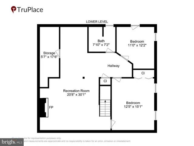 a view of a lake with beach and large trees