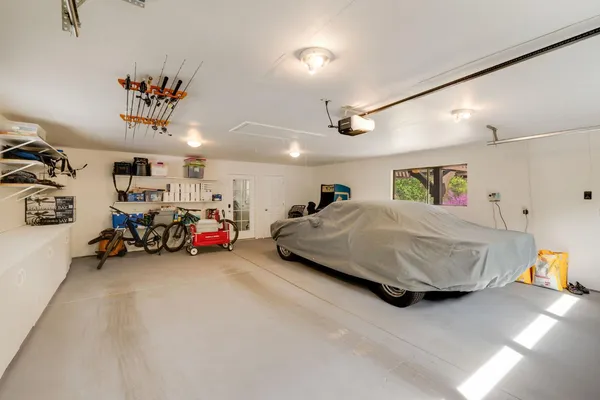 a bathroom with a sink a washer and dryer