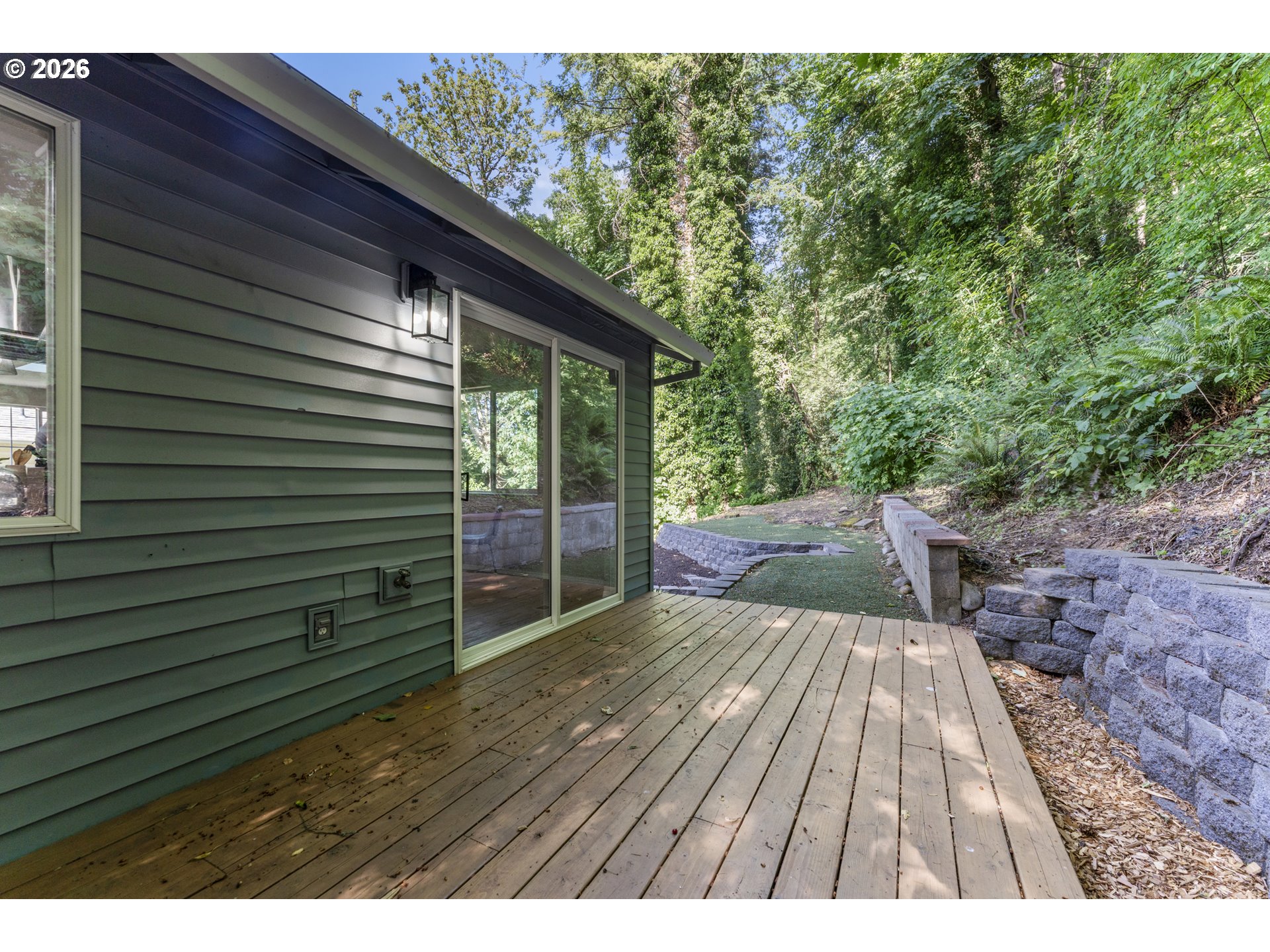 4024 Southeast 154th Place Portland, OR 97236 - Photo 35 of 43 a balcony with wooden floor