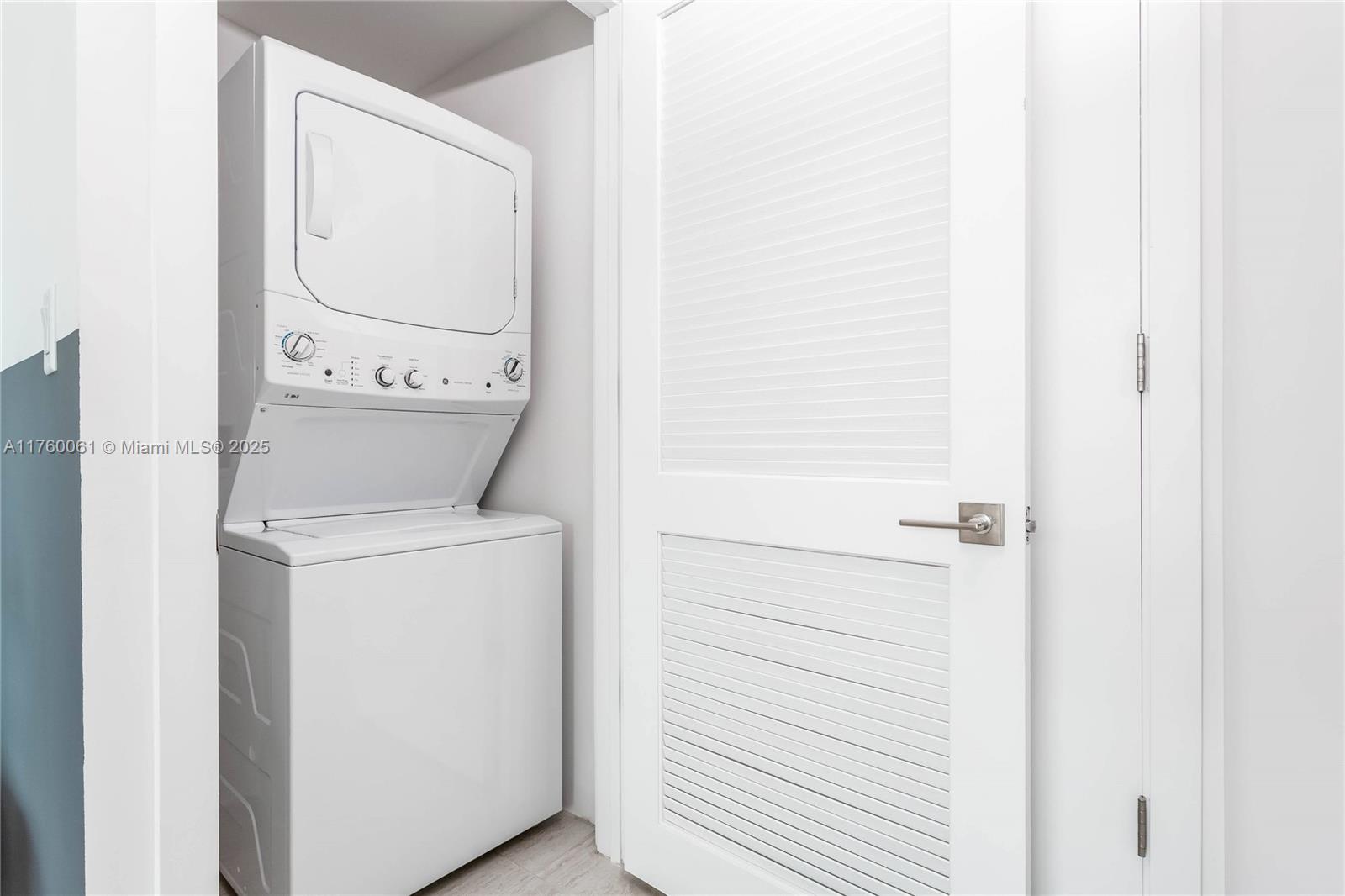 3900 Biscayne Boulevard, Unit S314 Miami, FL 33137 - Photo 15 of 15 a utility room with dryer and washer