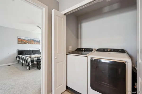 a utility room with dryer and washer