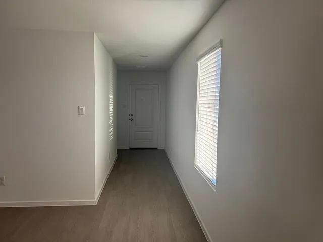 a view of a room that has a window