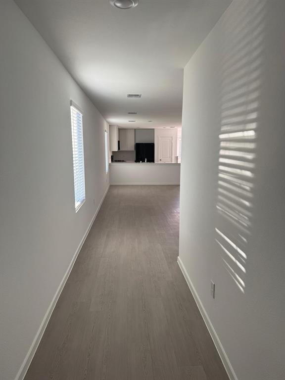 7505 Fenton Parkway Pilot Point, TX 76258 - Photo 5 of 30 a view of a room that has a window