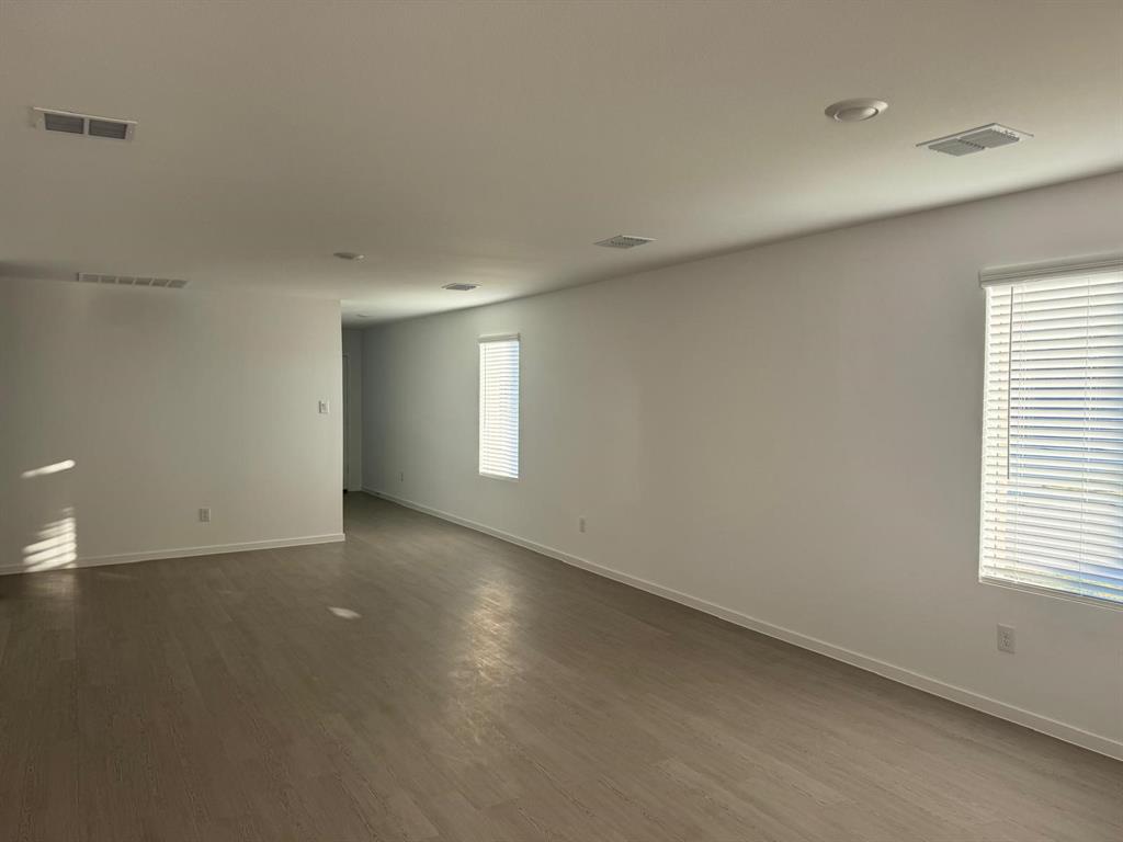 7505 Fenton Parkway Pilot Point, TX 76258 - Photo 6 of 30 an empty room with windows