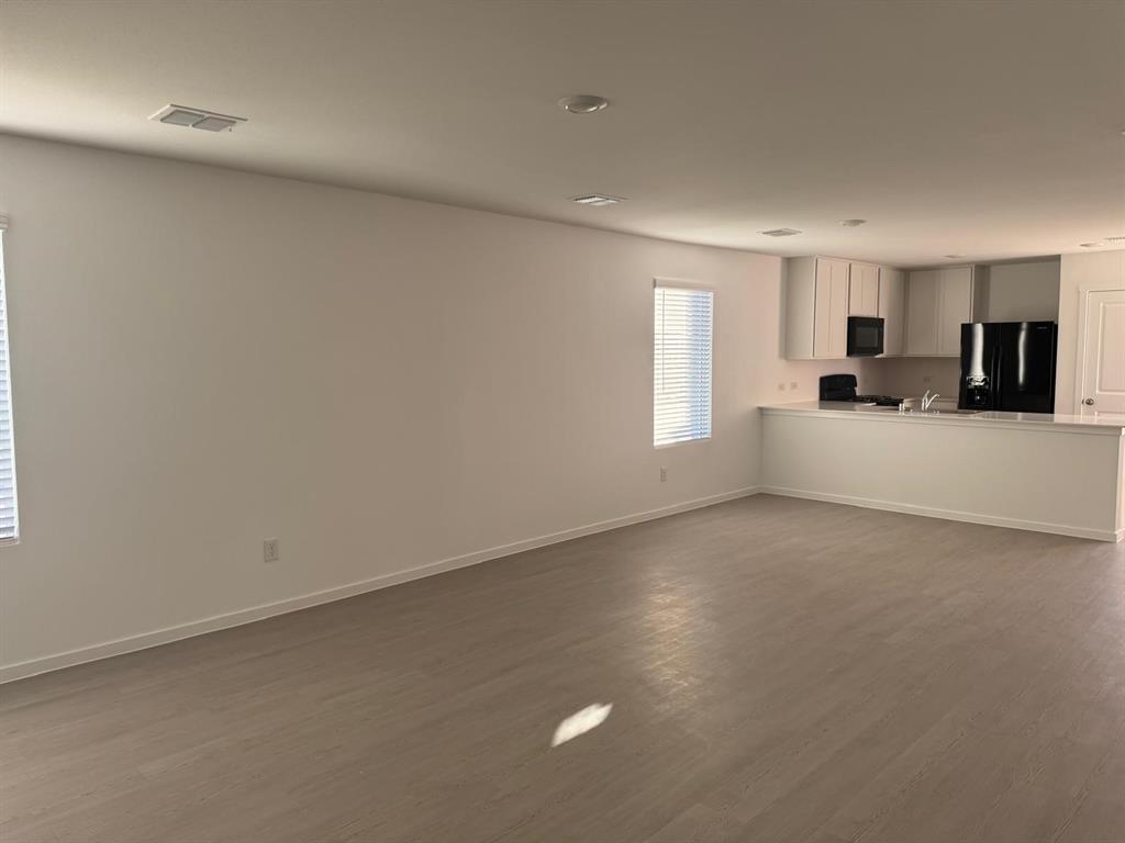 7505 Fenton Parkway Pilot Point, TX 76258 - Photo 7 of 30 a view of a kitchen with a sink and a window