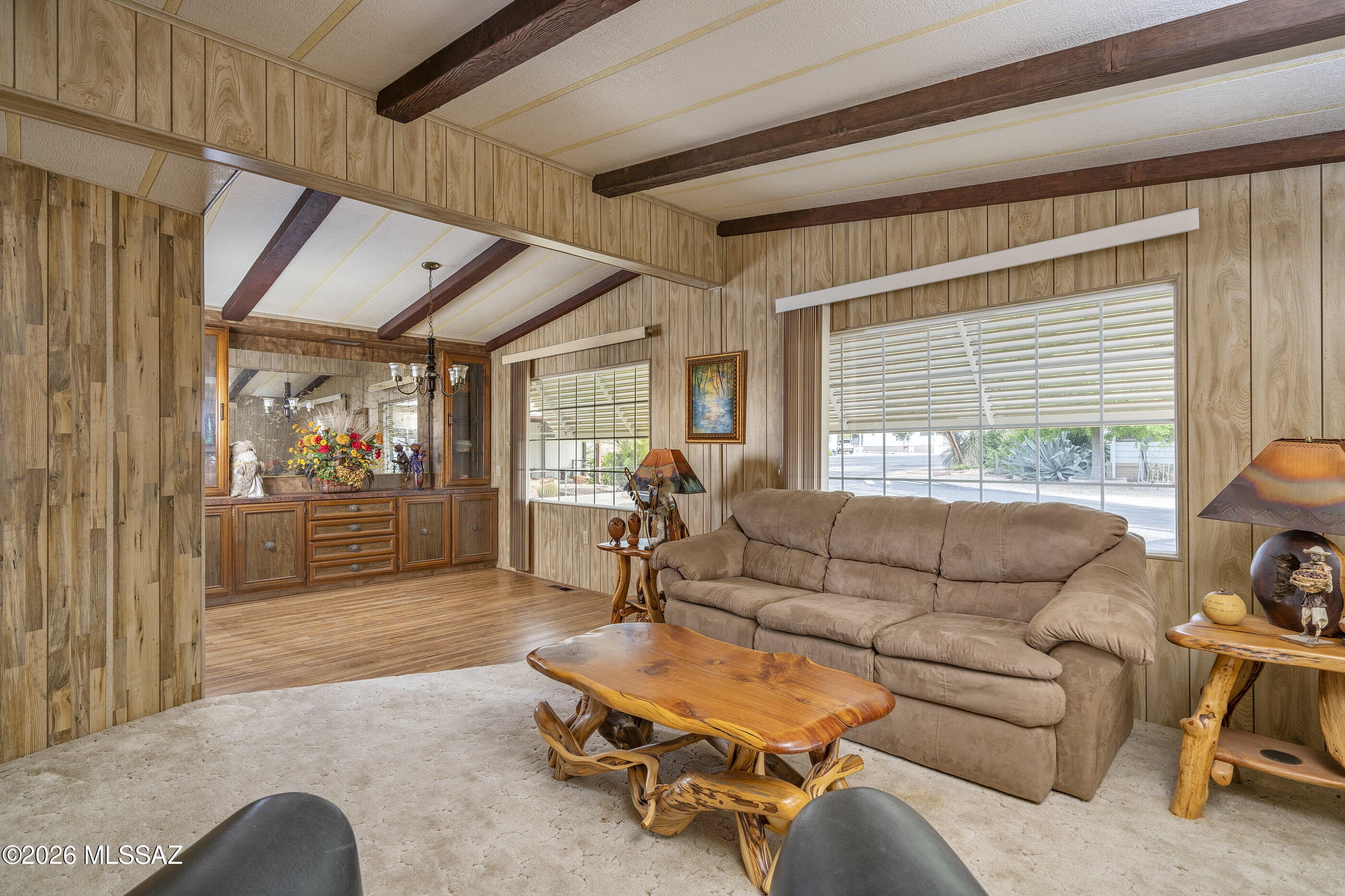 6121 West Flying M Street Tucson, AZ 85713 - Photo 7 of 25 a living room with furniture and a window