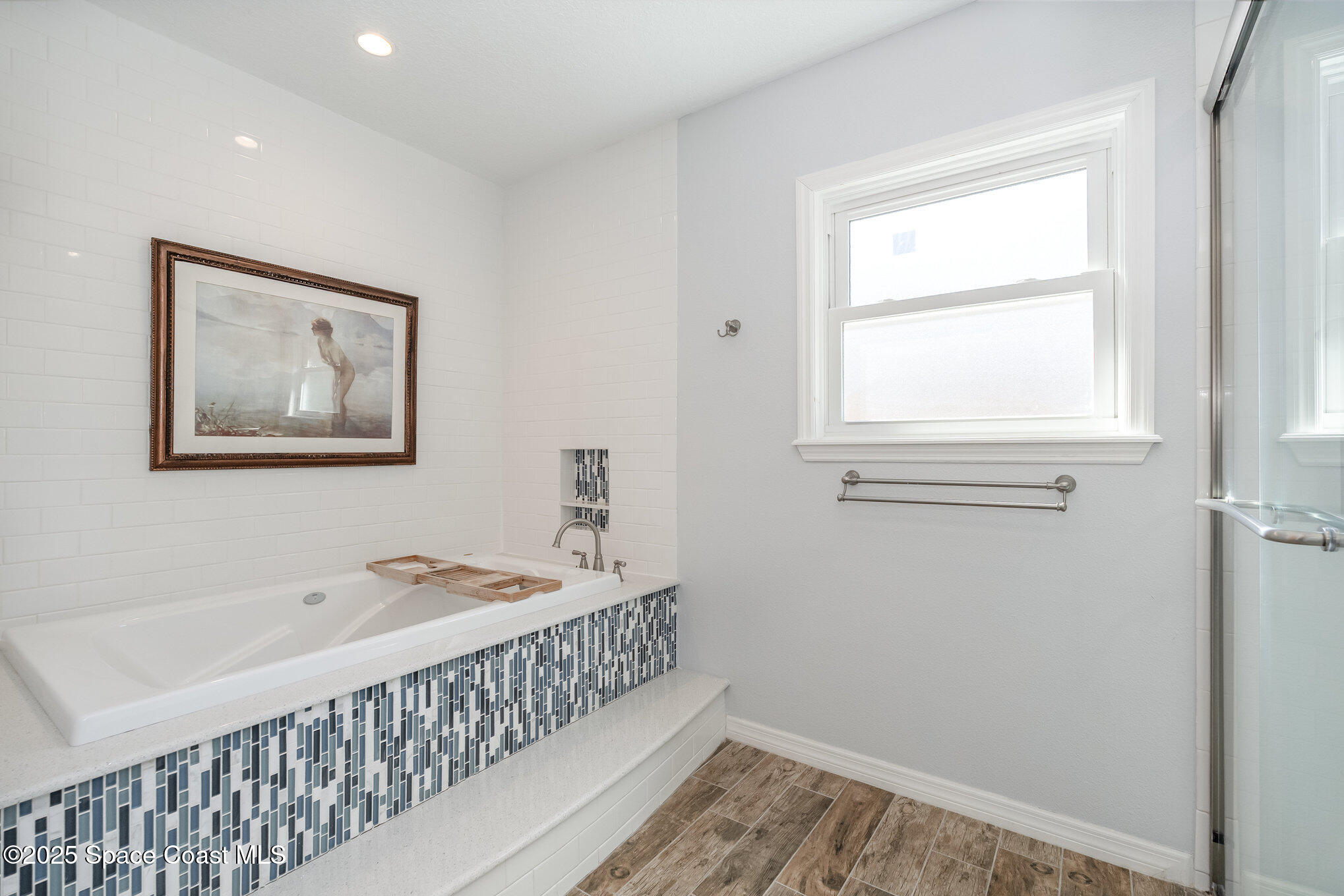 6203 Ridgewood Avenue Cocoa Beach, FL 32931 - Photo 21 of 37 a bedroom with a bed and a window