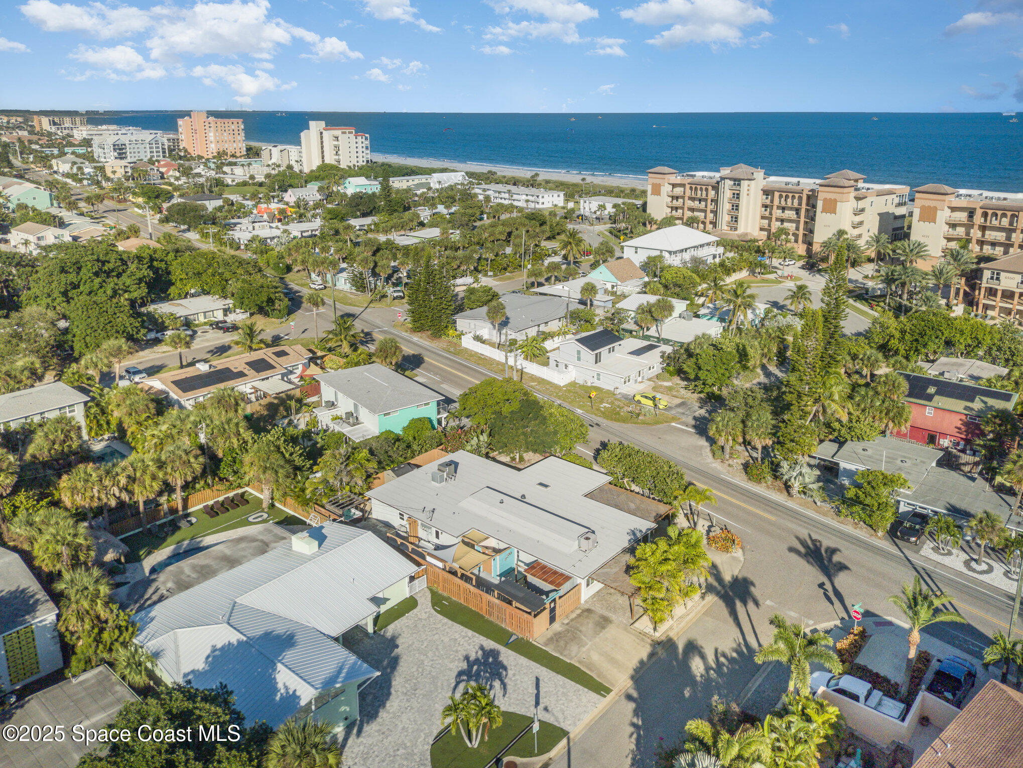 6203 Ridgewood Avenue Cocoa Beach, FL 32931 - Photo 3 of 37 a view of a city with tall buildings