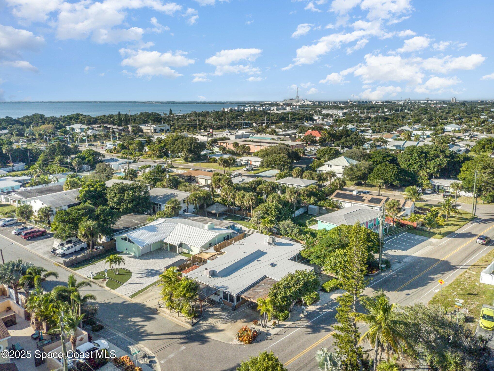 6203 Ridgewood Avenue Cocoa Beach, FL 32931 - Photo 33 of 37 an aerial view of residential houses with outdoor space