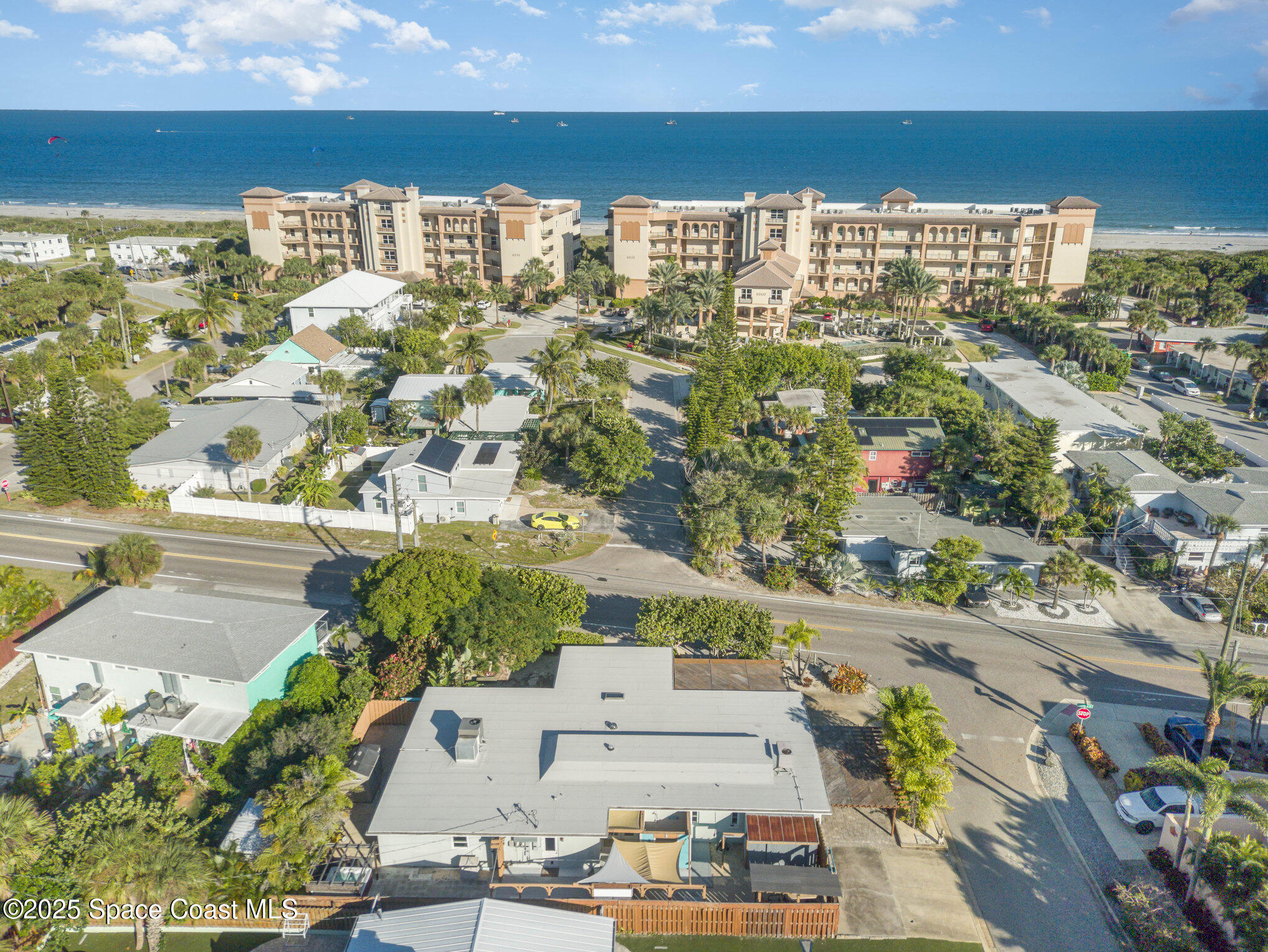 6203 Ridgewood Avenue Cocoa Beach, FL 32931 - Photo 35 of 37 an aerial view of residential houses with outdoor space