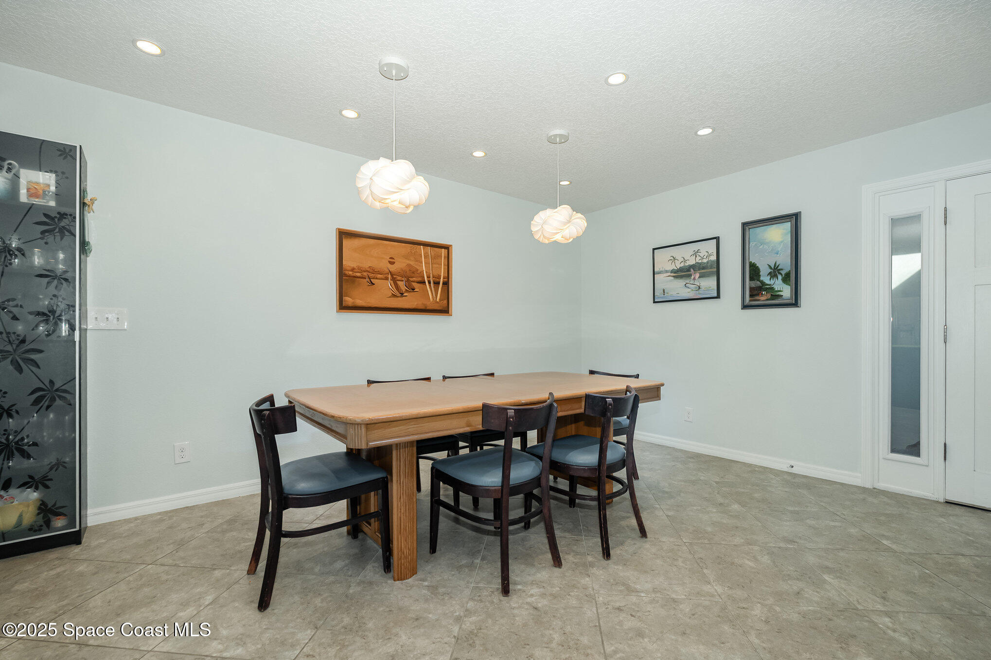 6203 Ridgewood Avenue Cocoa Beach, FL 32931 - Photo 8 of 37 a view of a dining room with furniture