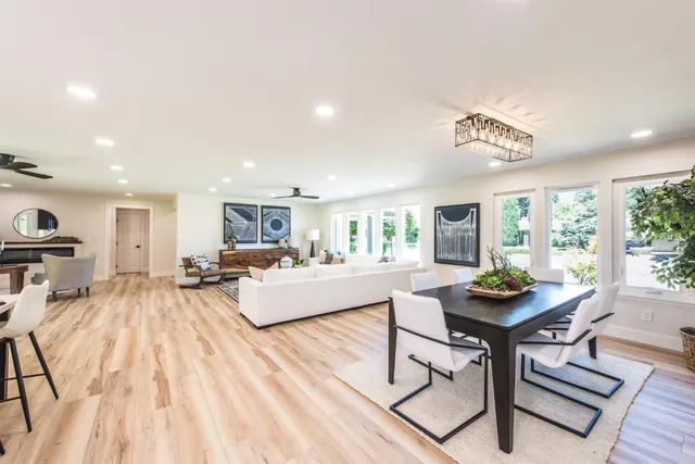 a living room with furniture and a table