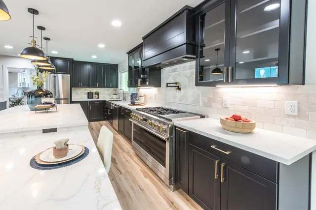 a kitchen with a stove and cabinets