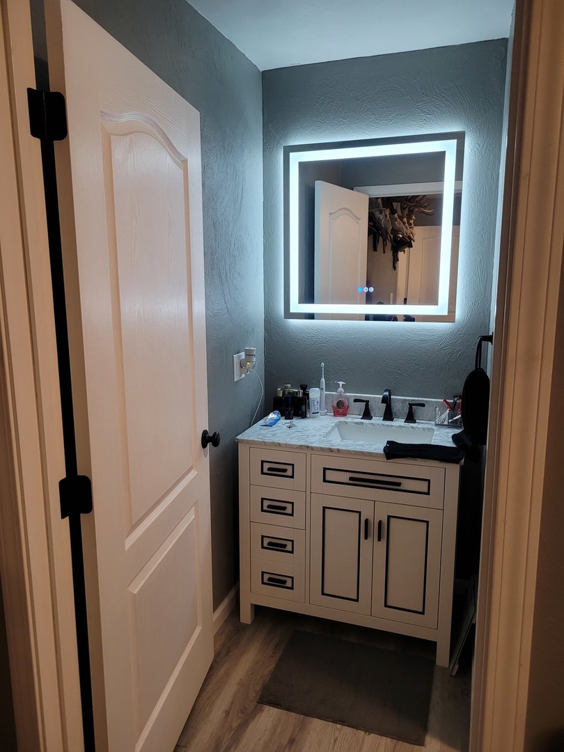 1102 East Bethel Road Mount Vernon, IL 62864 - Photo 15 of 16 a bathroom with a granite countertop sink and a mirror