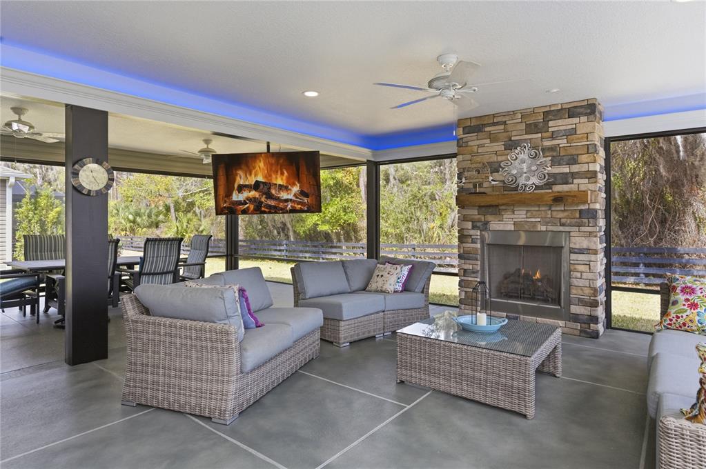 4788 Rostas Way The Villages, FL 32163 - Photo 14 of 40 a living room with furniture and a fireplace